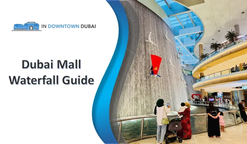 Dubai Mall Waterfall: The Complete Visitor Guide Dubai Mall Waterfall with diver sculptures inside Dubai Mall attraction